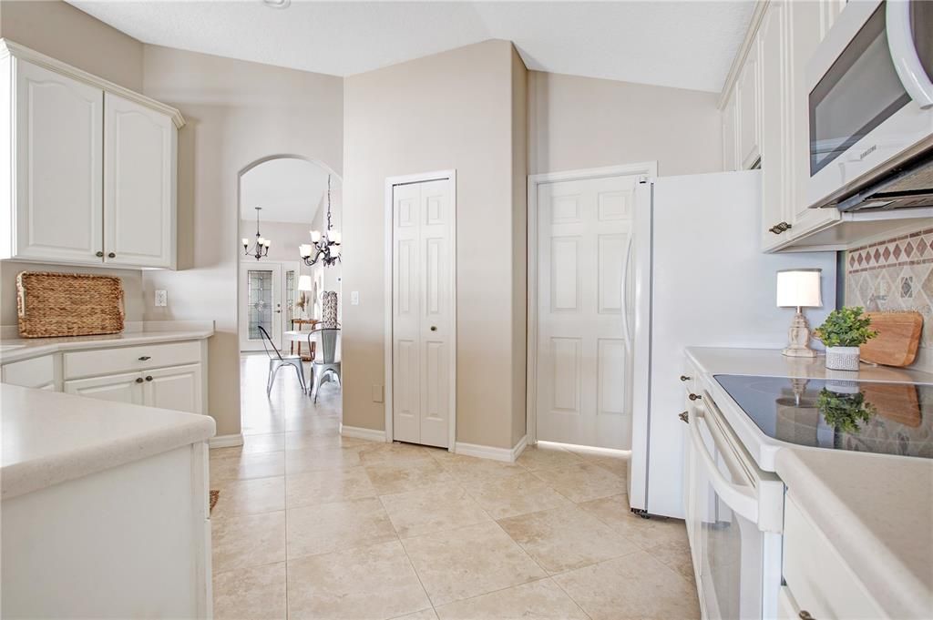 Spotless Kitchen with Closet Pantry and Inside Laundry Room and Desk Area