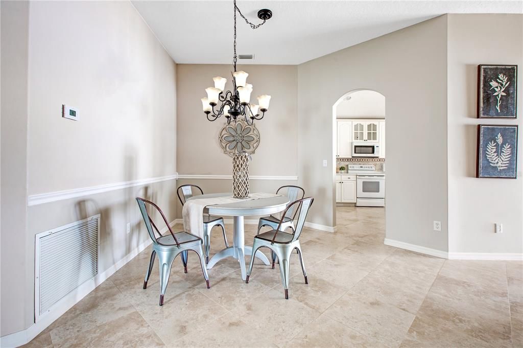 Formal Dining Room with entry to Open Kitchen