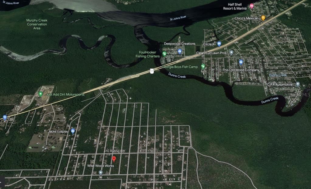 5 minutes drivetime from 410 Rustic Road to Dunne Creek, which connect to St. Johns River