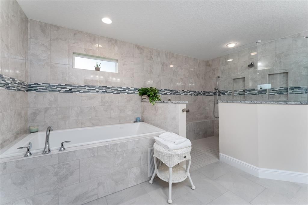 BATHROOM #3 also features a JACUZZI TUB with full TILE SURROUND