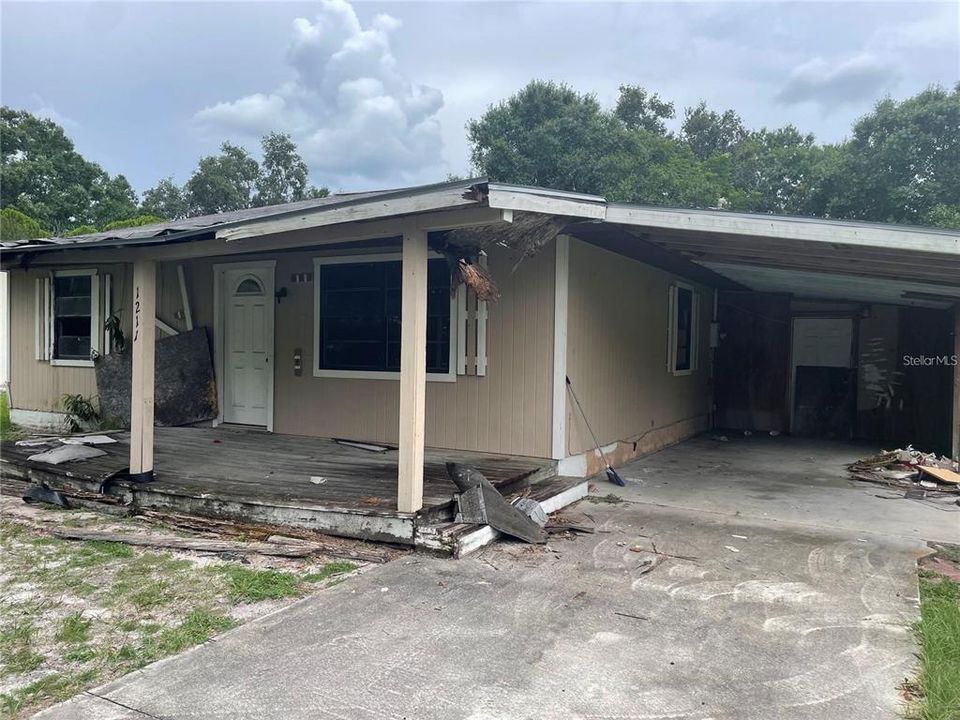 Exterior Front w/porch and carport