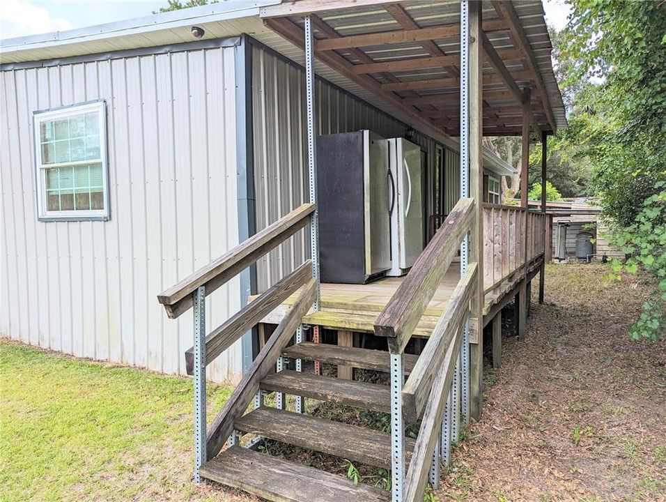 back porch (freezers do not convey)