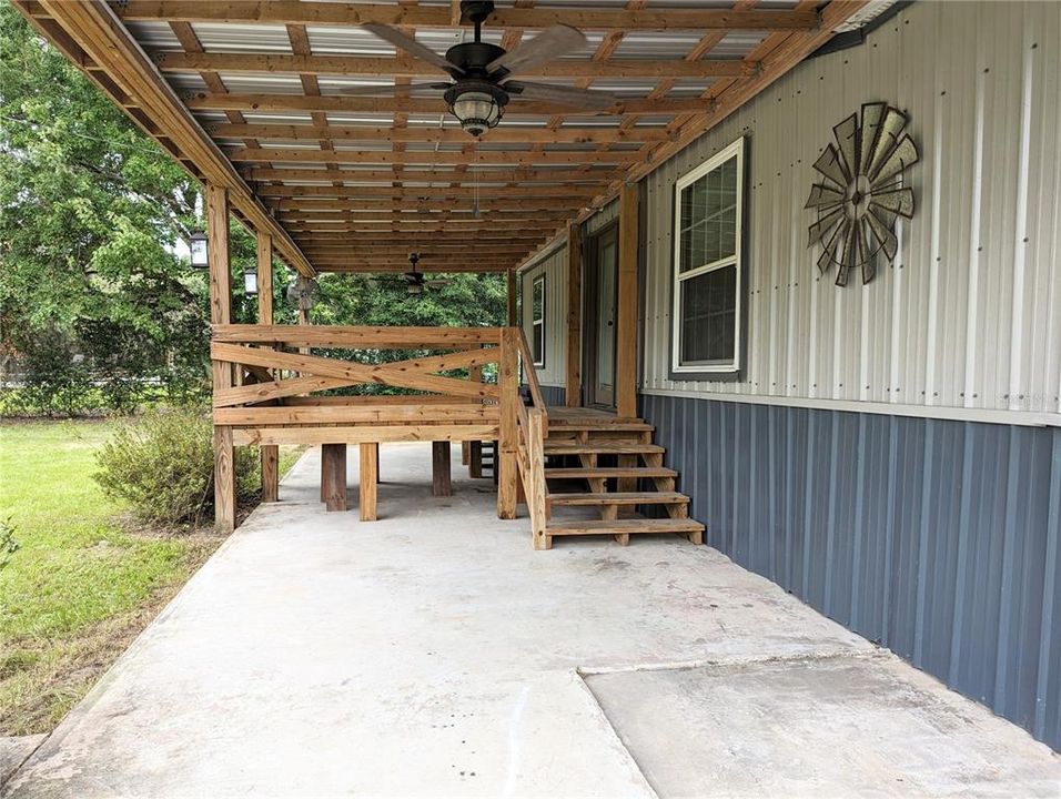 Covered front porch. Place your grill and patio furniture here :)