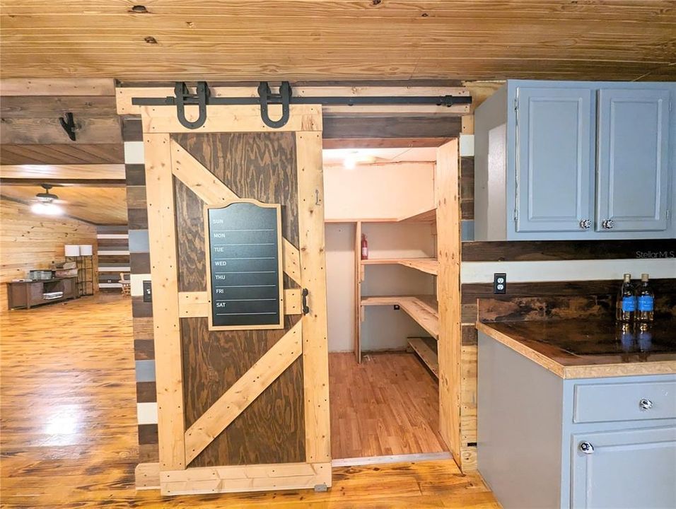 Barn door into the pantry/laundry room