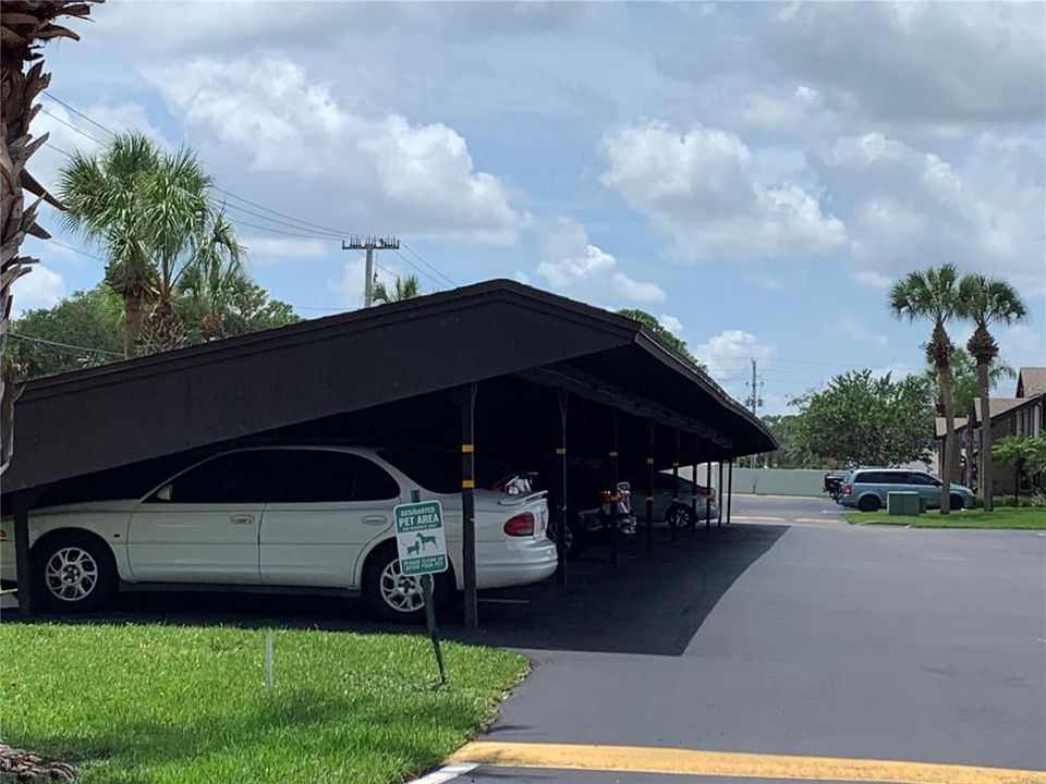 1 space assigned parking covered carport for each unit