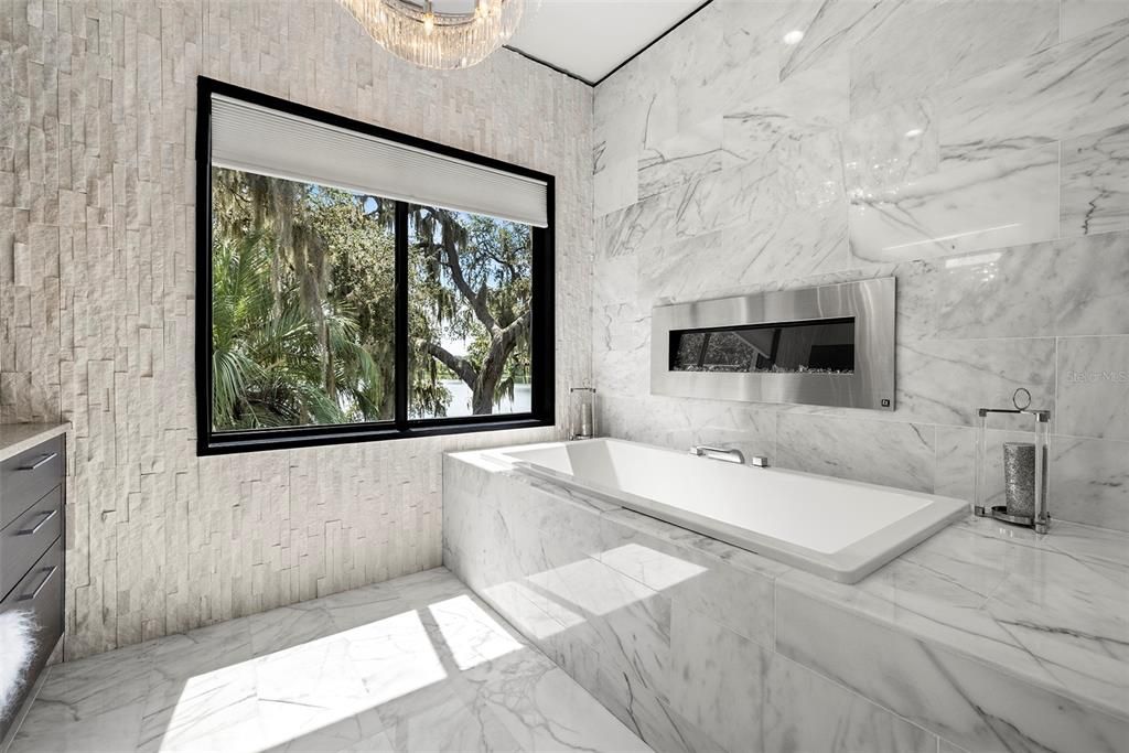 PRIMARY ENSUITE BATHROOM WITH ELECTRIC FIREPLACE