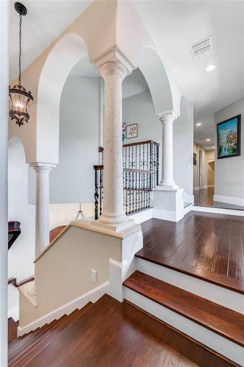 First floor mutli-level staircase in the front foyer