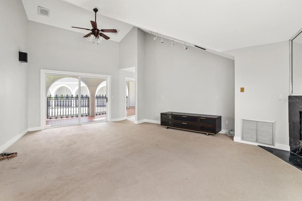 Up stairs living space/family room with access to upstairs balcony