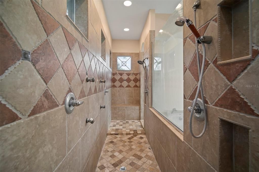 17 foot walk in shower with double shower heads & 4 body sprays