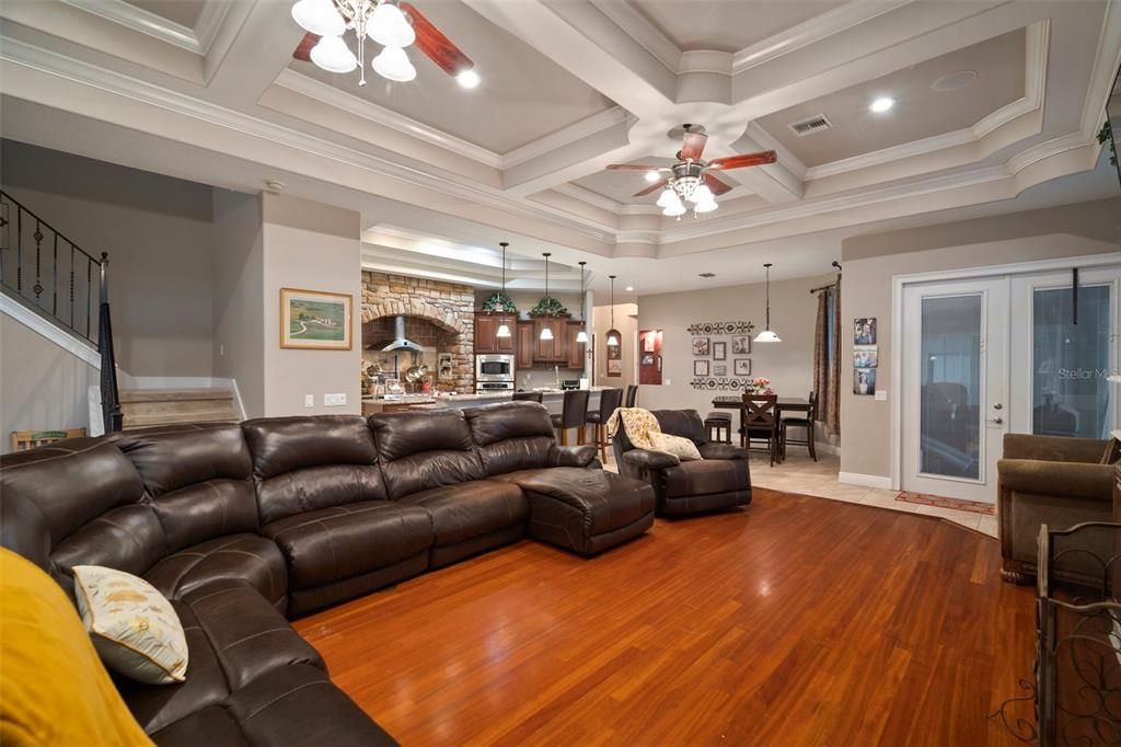 Gleaming wood floors in the spacious family room