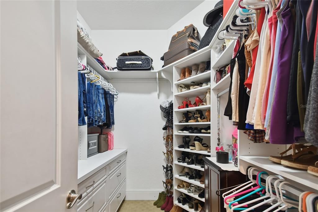 Master closet with California Closet cabinetry