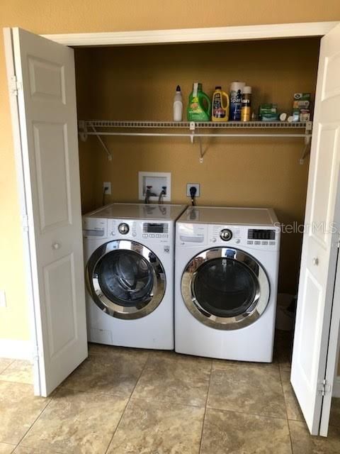 laundry room in the inlaw suite/apartment