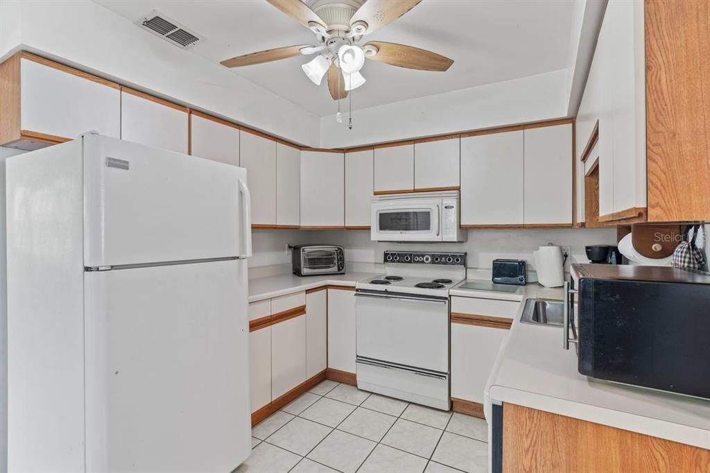 Bright kitchen with dining area.