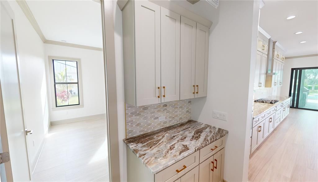 Garage foyer, laundry room and ensuite guest room