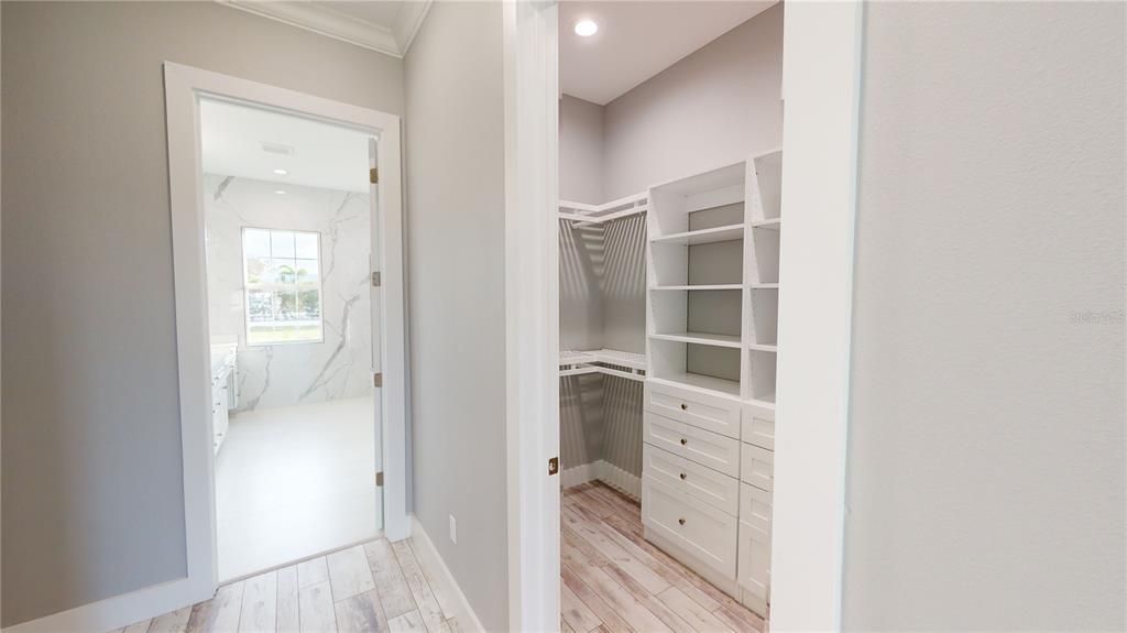 Primary ensuite bath and 1 of 2 closets