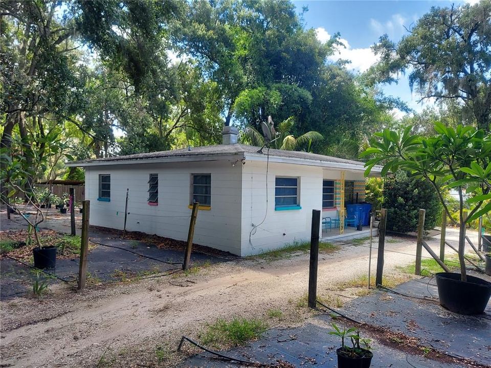 View of older single-family residence that is utilized as nursery office. Building NEEDS repairs if kept.