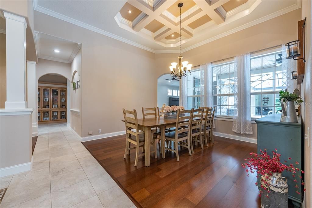 Formal dining room with coffered ceiling makes an elegant statement.