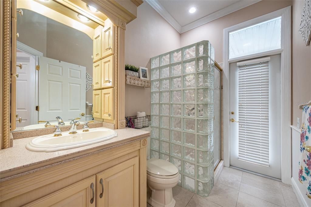 This bathroom has access to the pool and lanai area, so no dripping bathing suits through the house.