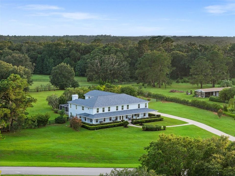 Experience the pleasure of 2.5 acres filled with lush greenery, offering the perfect space for farm animals and even the possibility of creating an equestrian property, should you desire to do so.