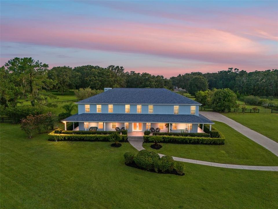 Grand estate with immaculate landscaping.