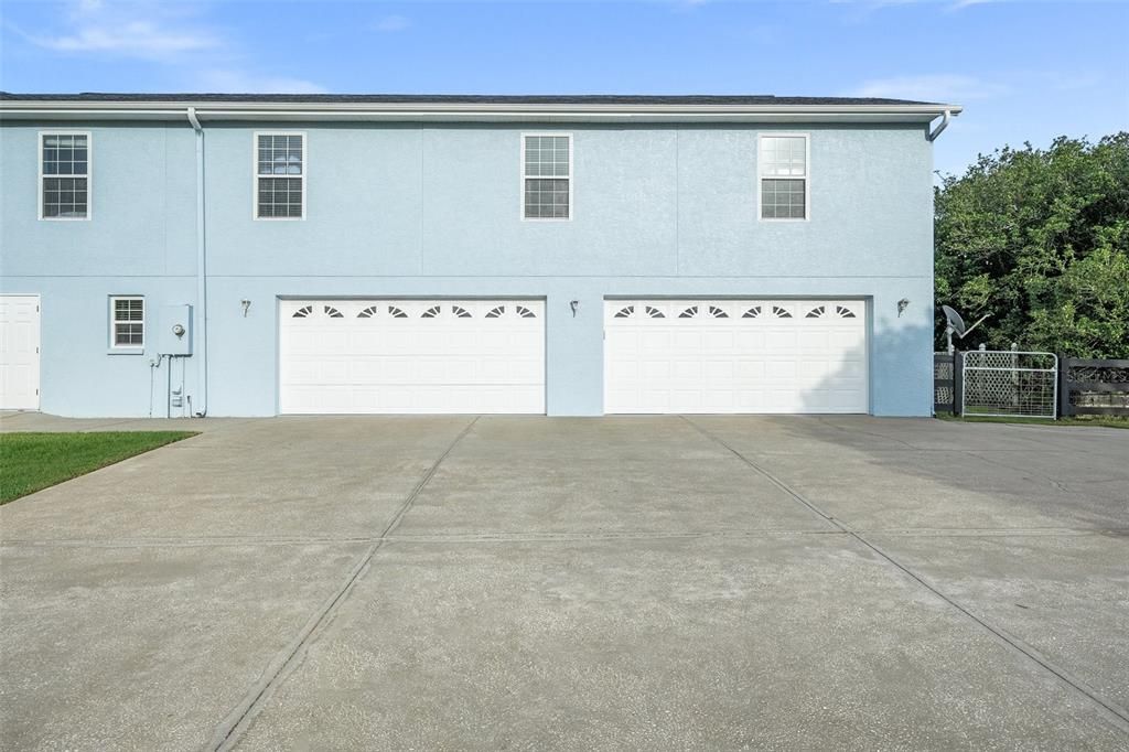 Car enthusiasts will delight in the spacious 4-car garage, while also benefiting from ample storage space provided by the expansive exterior storage room.