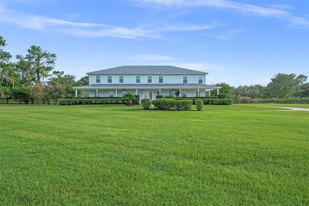 Grand estate with immaculate landscaping.