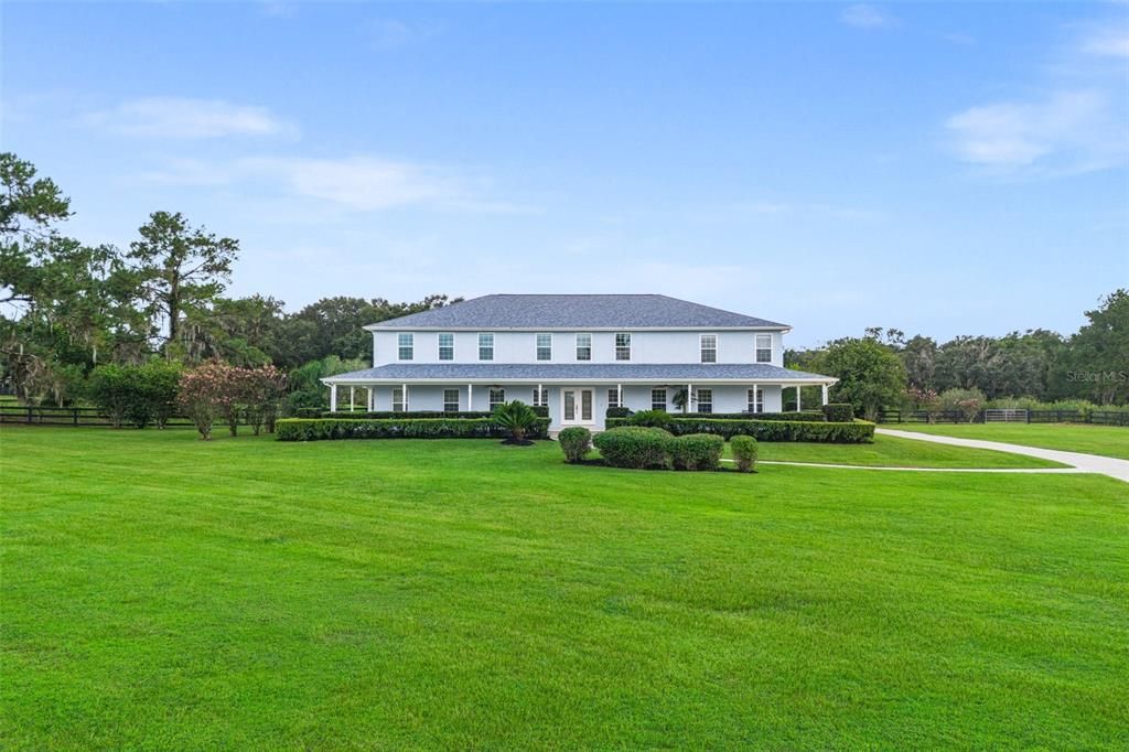 Experience the pleasure of 2.5 acres filled with lush greenery, offering the perfect space for farm animals and even the possibility of creating an equestrian property, should you desire to do so.