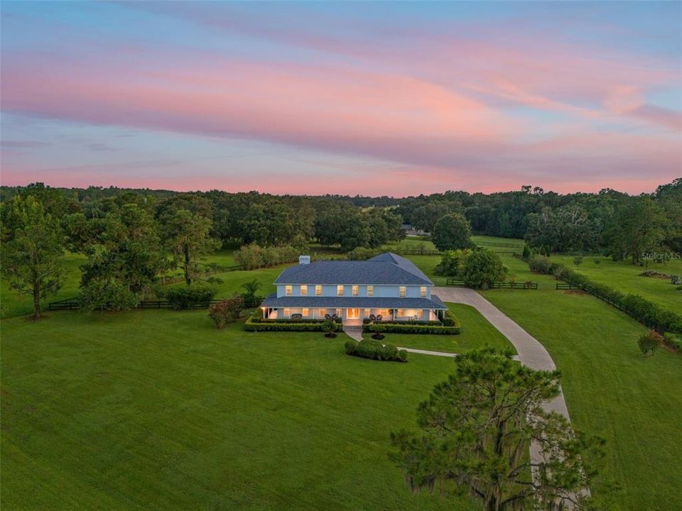 Grand estate with immaculate landscaping.