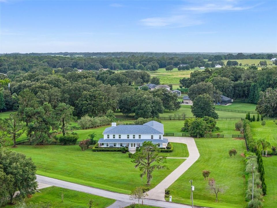 Experience the pleasure of 2.5 acres filled with lush greenery, offering the perfect space for farm animals and even the possibility of creating an equestrian property, should you desire to do so.