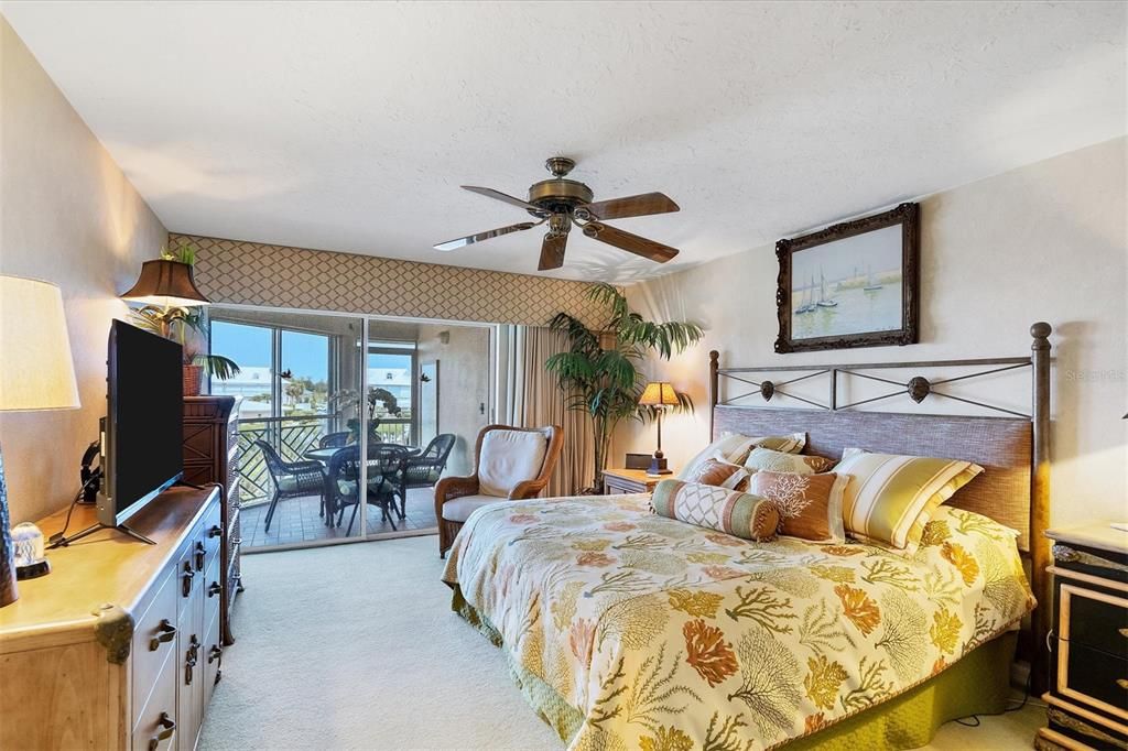 Master Suite extends to lanai with views overlooking the marina