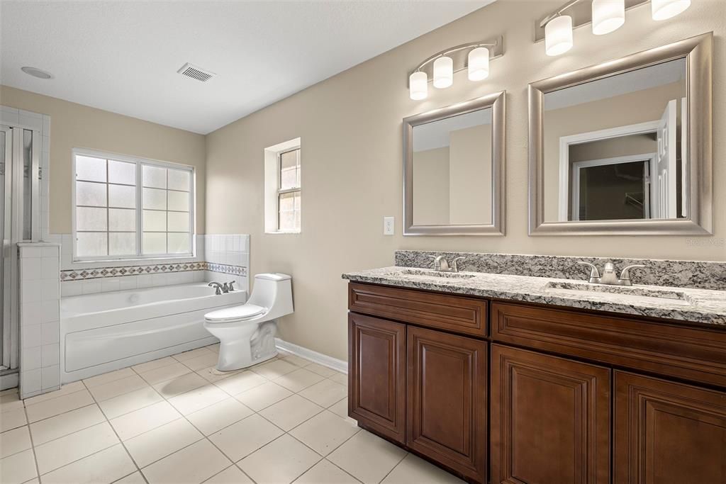 MASTER-BATHROOM with Dual-Sink Stone-Vanity, Tub and Separate Shower