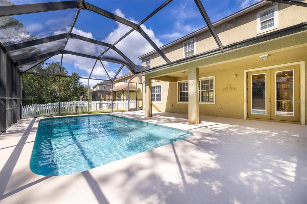 PRIVATE POOL and EXTENDED LANAI and PATIO with WOODED CONSERVATION VIEWS