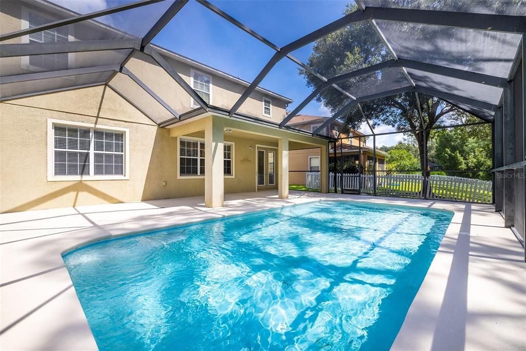PRIVATE POOL and EXTENDED LANAI and PATIO with WOODED CONSERVATION VIEWS