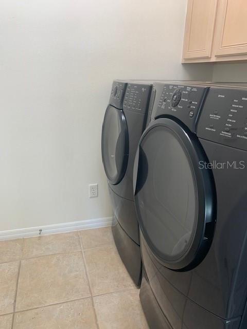 just off the kitchen is the laundry room that leads out to the garage.