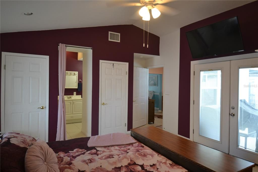 View from main bedroom to the pool area through the french door or to the entertaining room or to the bathroom