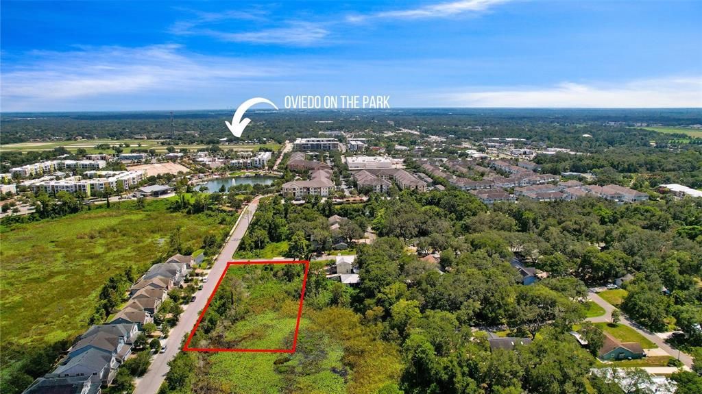 Rare opportunity to BUILD YOUR DREAM HOME on a 3/4 ACRE LOT just steps from Oviedo on the Park!