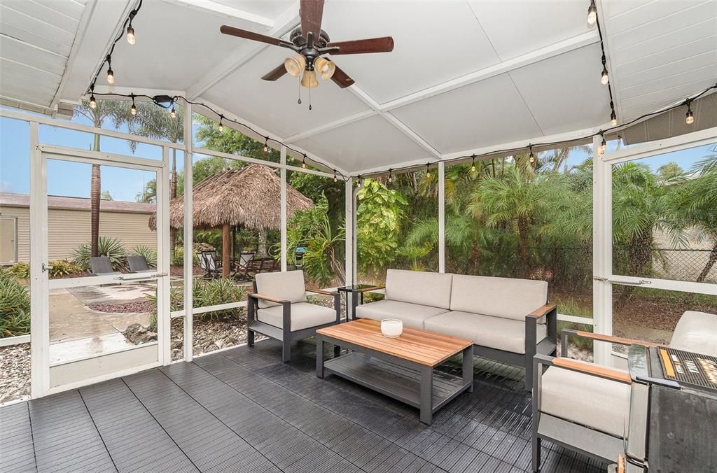 Covered, screened in patio perfect for entertaining
