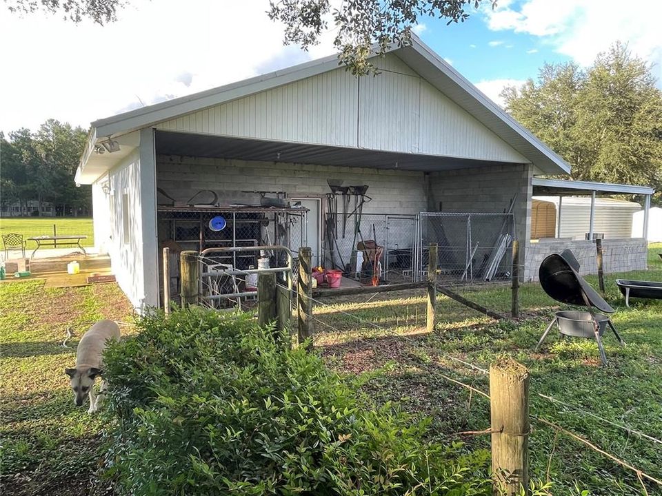 Originally This end of barn was designed with 2 Horse Stalls and designed so many more could be added.  Currently set up for the chickens and a dog kennel that can both be easily removed.