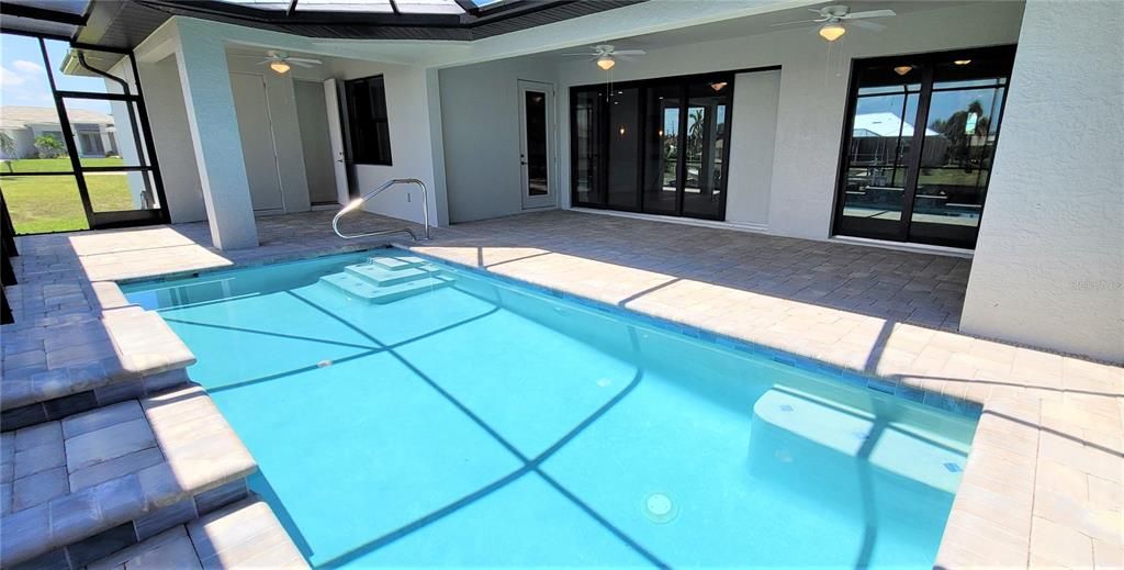 Screened pool enclosure