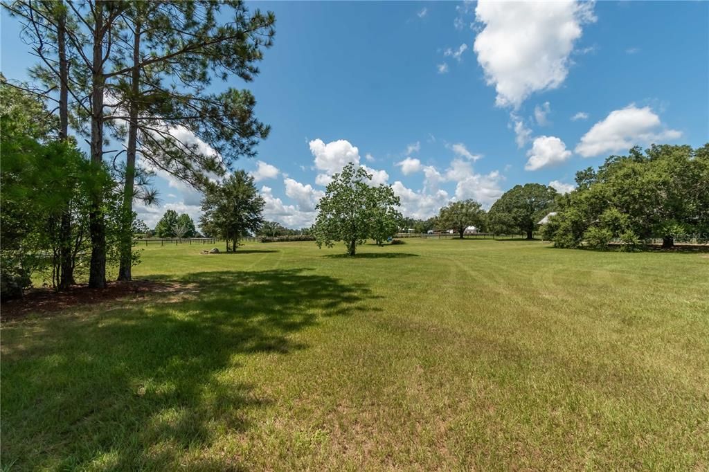 Lots of pretty green space outside of the home .