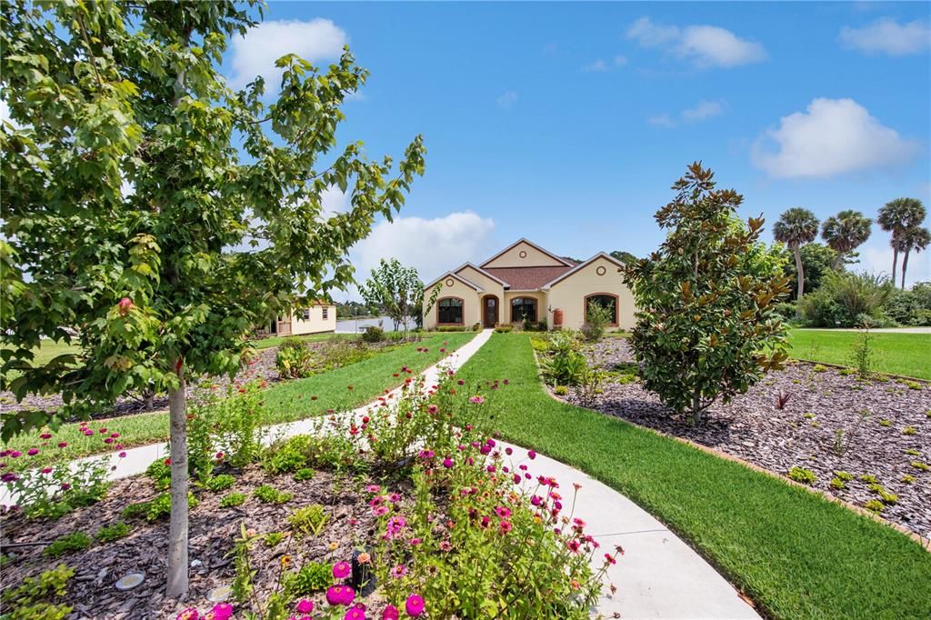 About 150' Lakefrontage! Beautiful Xeriscape