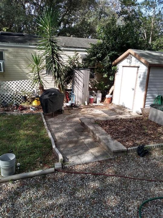 BBQ area and Shed with W/D hook up