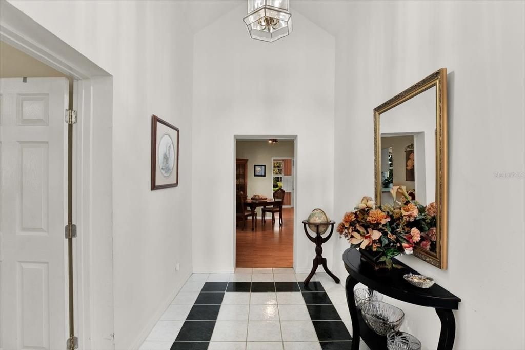 You have a bright & welcoming foyer for family & friends to enter your home.