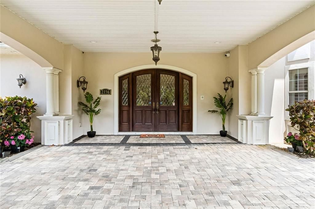 The statement entrance beckons you in under the portico where you can receive guests