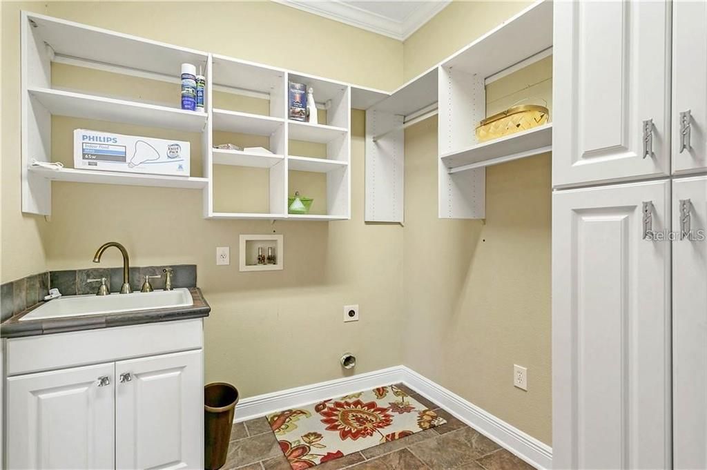 Laundry room with lots of closet and storage space