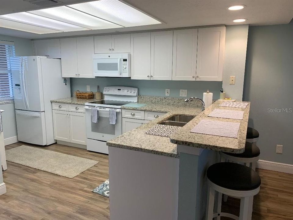 Beautiful upgraded kitchen with granite