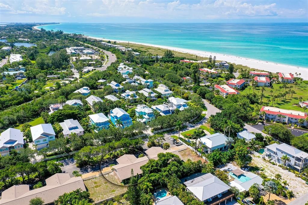 Ariel view of Unit #7, the Gulf of Mexico Drive and the beach coastline.