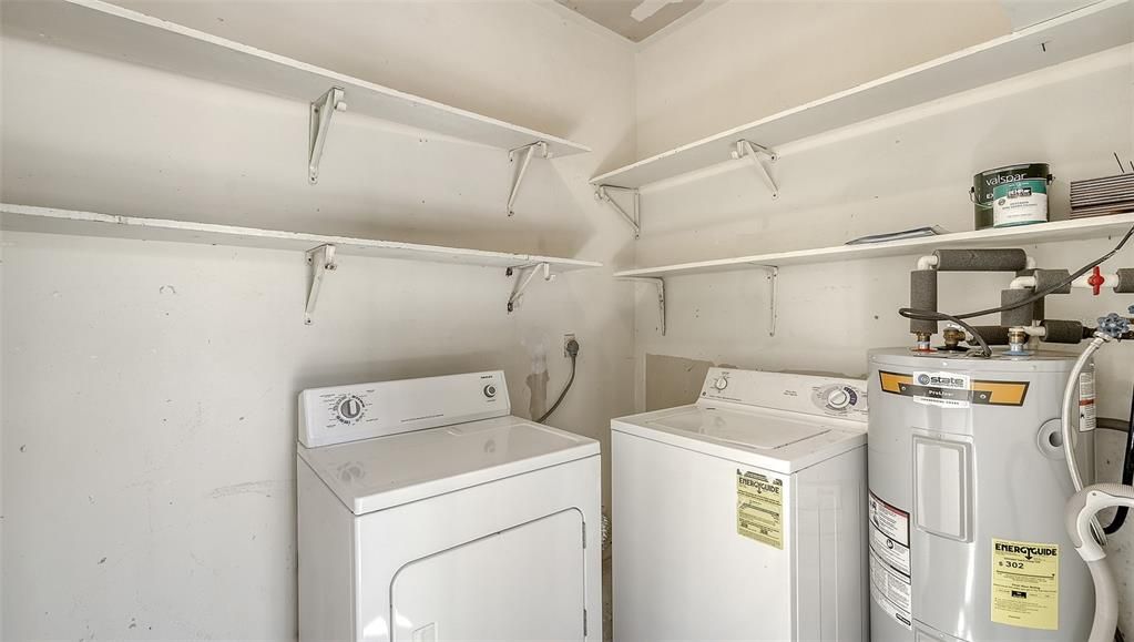 Unit #7 - Utility, mechanical and laundry room off the screened front lanai (not air-conditioned)