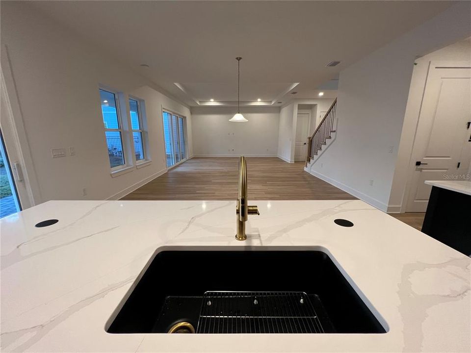 Gourmet Kitchen with waterfall island and double-stacked cabinetry