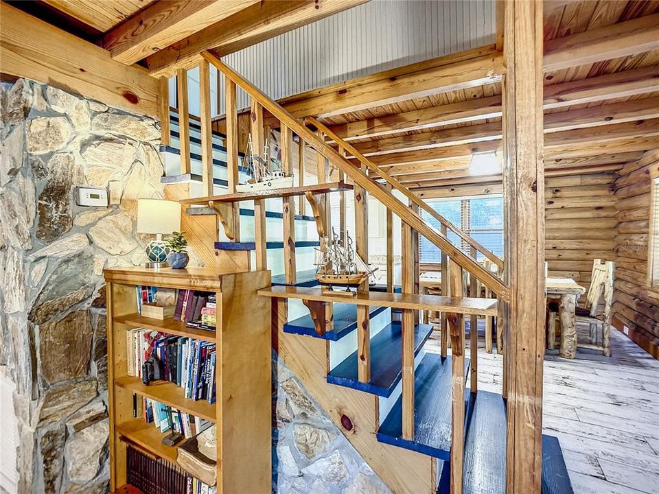 Incredible stonework in this stunning, renovated, & FURNISHED log home.